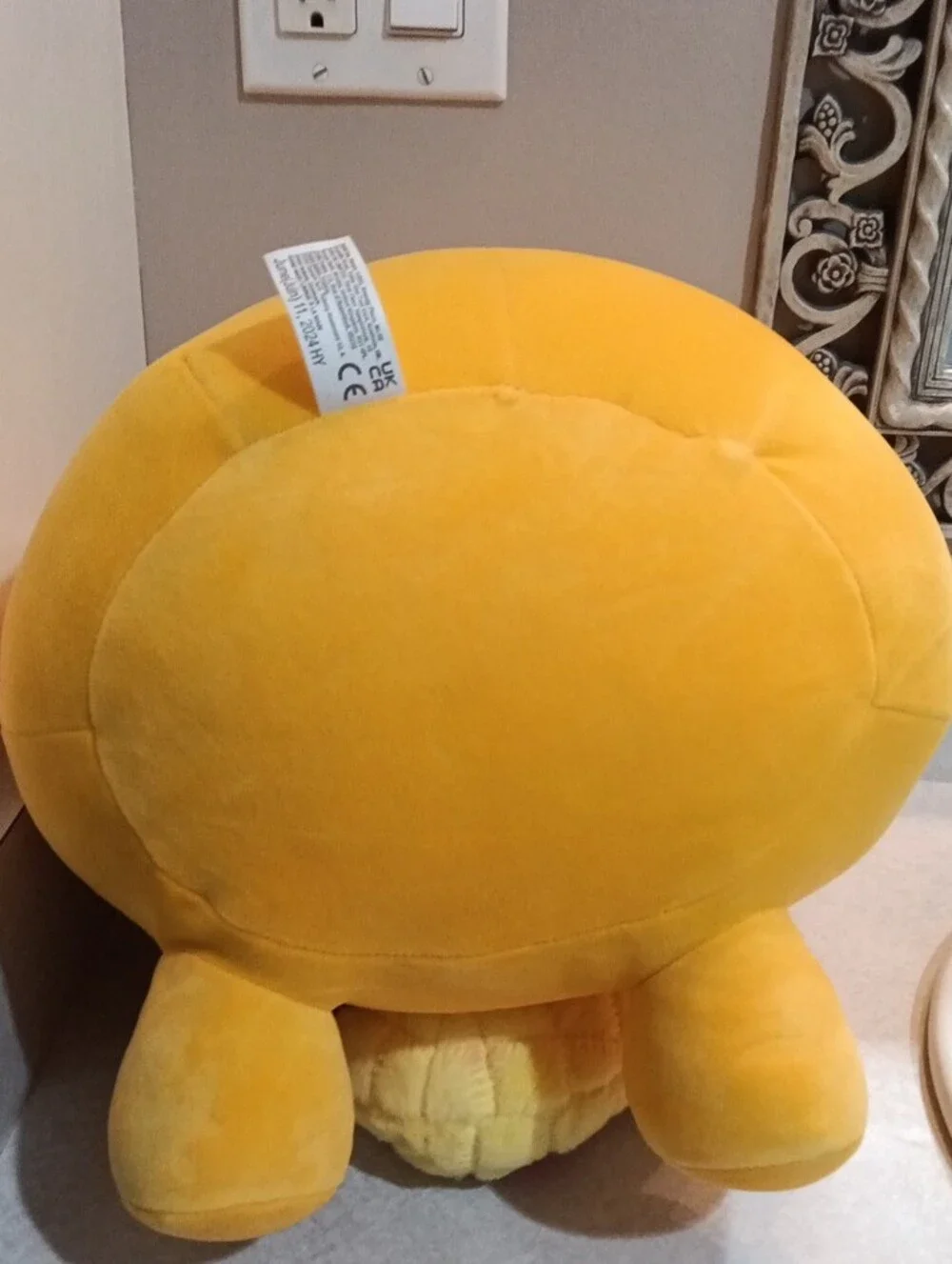 Yellow Sloth Plush Holding Dole Pineapple Toy